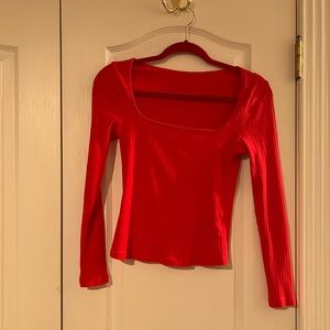 extremely low cut red top